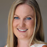 A headshot of ABC News reporter Nicole Asher.